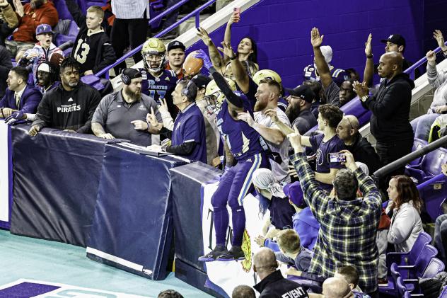 Massachusetts Pirates and their fans celebrate a touchdown