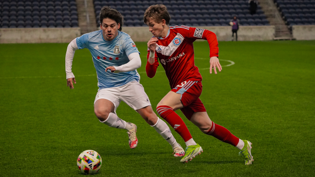 Chicago Fire Academy midfielder Vitaliy Hlyut (right)