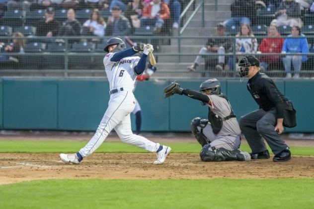 Tri-City Dust Devils shortstop Chad Stevens takes a big swing