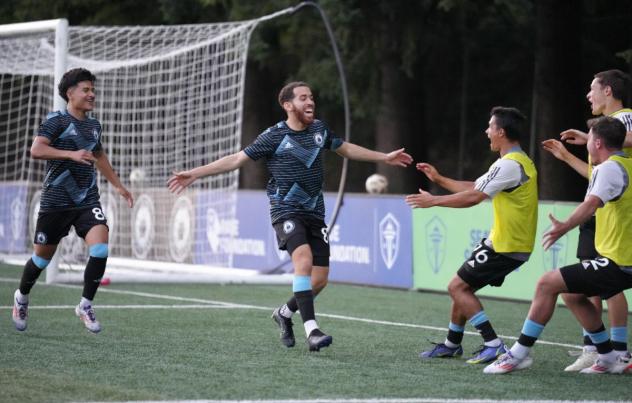 Tacoma Defiance's Chris Aquino, Faysal Bettache, and Blake Bowen celebrate win