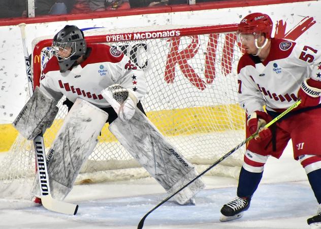 Allen Americans defenseman Ty Farmer (right)