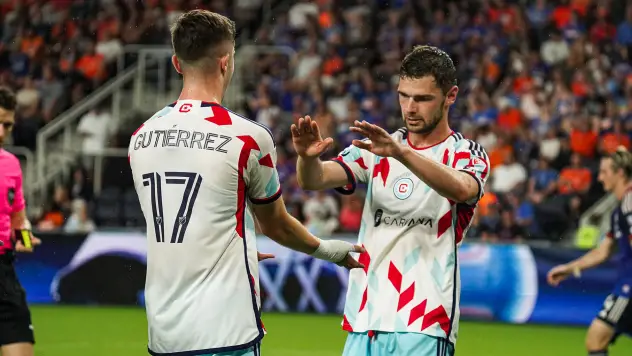Chicago Fire FC's Brian Gutiérrez congratulated by Hugo Cuypers