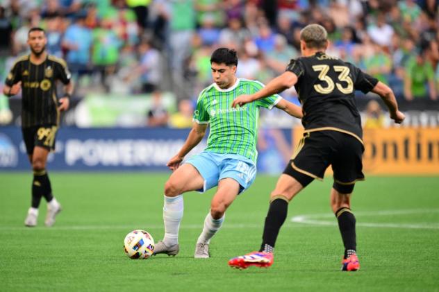 Seattle Sounders FC's Obed Vargas battles LAFC's Aaron Long