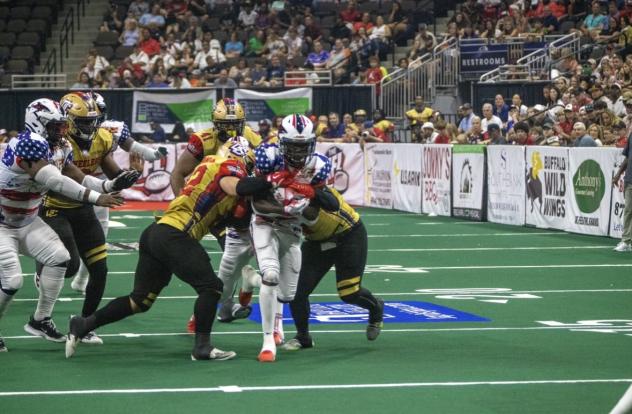 Jacksonville Sharks gain yardage against the Quad City Steamwheelers