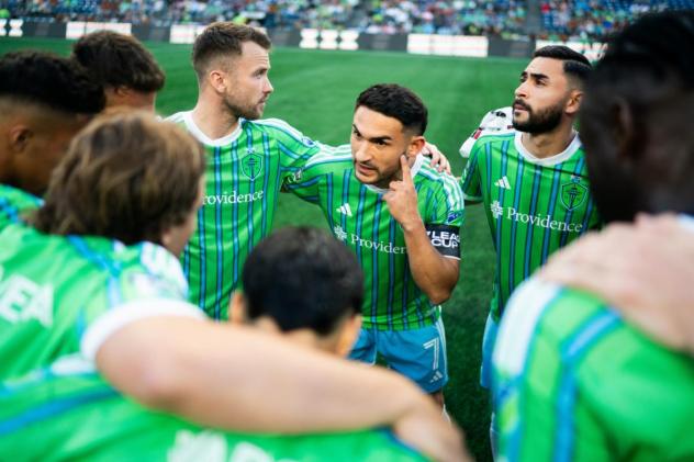 Sounders FC huddle