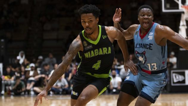 Niagara River Lions' AJ Davis and Montreal Alliance's Alain Louis in action
