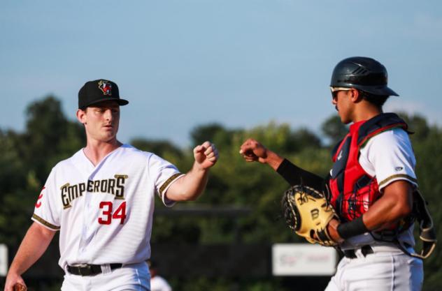 Rome Emperors pitcher Blake Burkhalter gets a fist bump