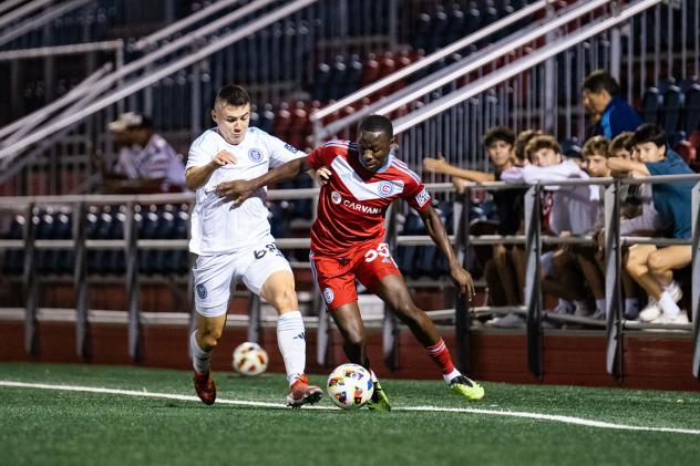 New York City FC II's Matthew Leong battles Chicago Fire FC II's Omari Glasgow