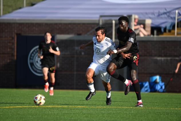 Chattanooga FC battles for the ball against Atlanta United 2