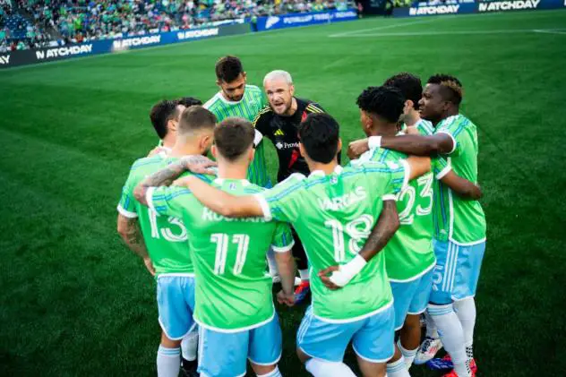 Sounders FC huddle