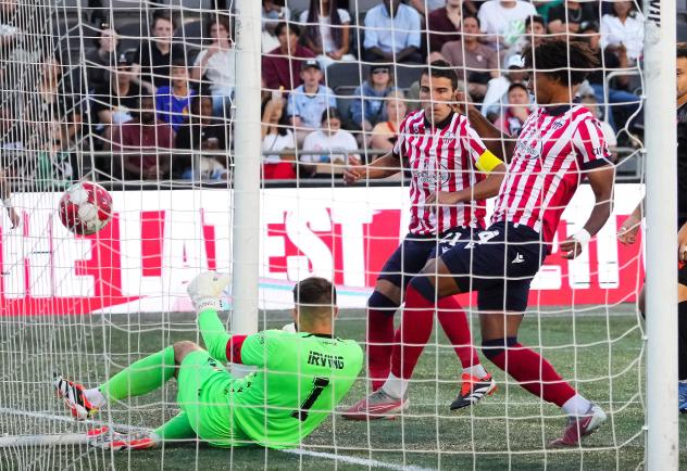Atlético Ottawa's Callum Irving battles Vancouver FC