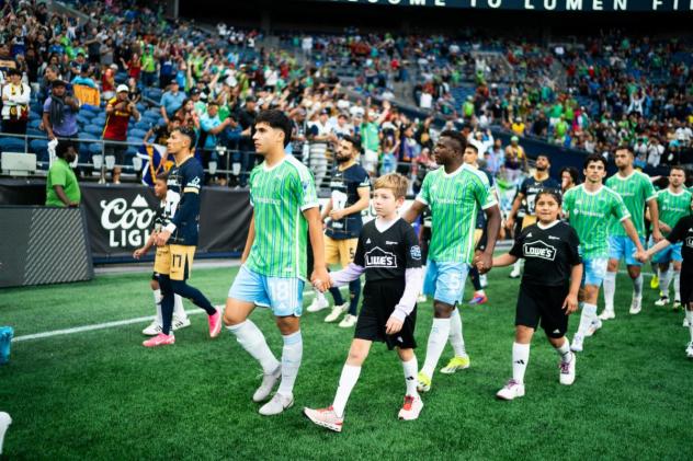 Sounders FC midfielder Obed Vargas (left) and defender Nouhou