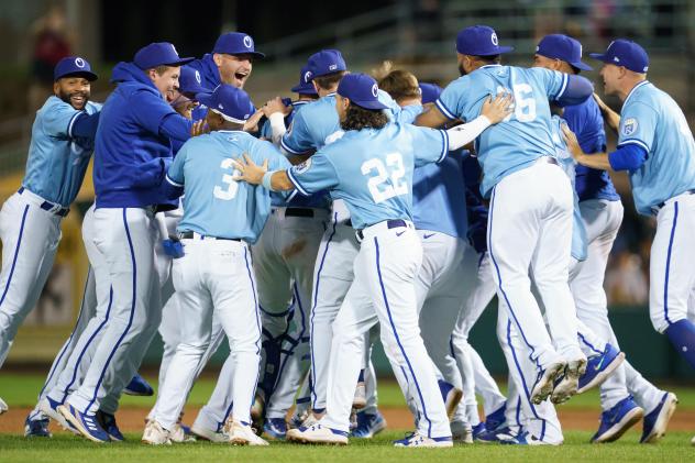 Omaha Storm Chasers rush the field after winning the International League Championship