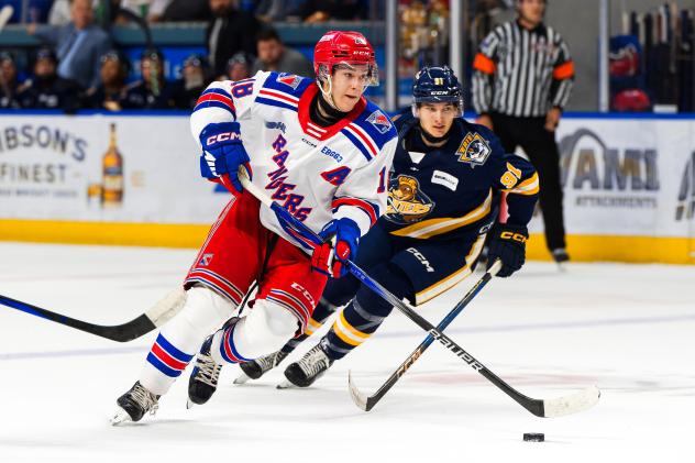 Kitchener Rangers' Cameron Reid versus Erie Otters' Brett Hammond
