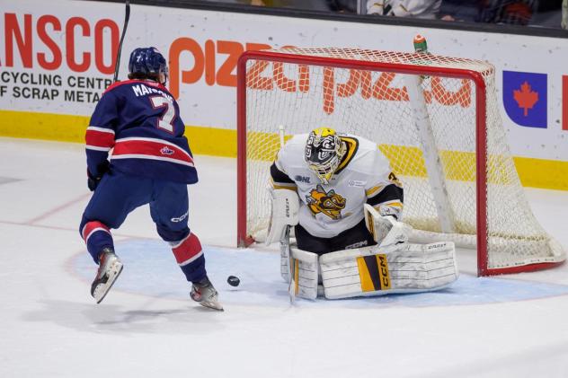 Saginaw Spirit's Calem Mangone versus Sarnia Sting's Nick Surzycia