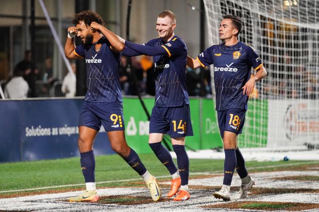 Rhode Island FC's JJ Williams, Mark Doyle, and Joe Brito on game night