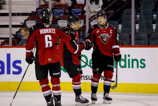 Vancouver Giants exchange fist bumps