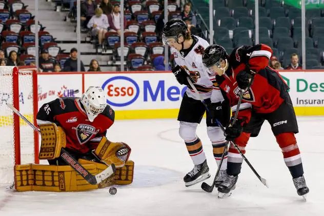 Vancouver Giants goaltender Burke Hood stops a shot