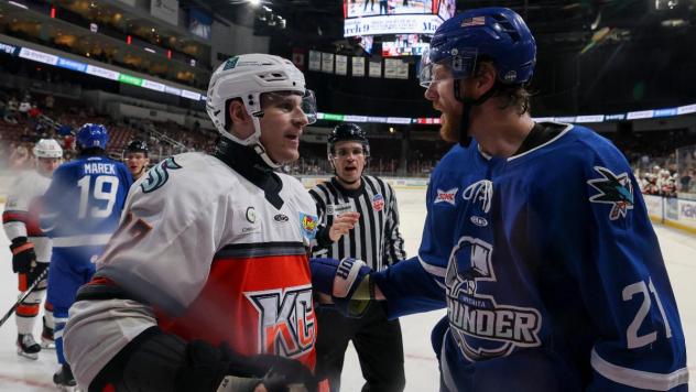 Wichita Thunder exchange greetings with the Kansas City Mavericks
