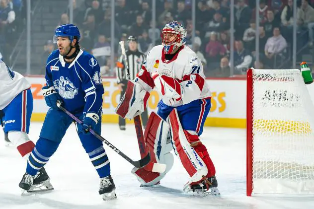 Syracuse Crunch's Joel Teasdale and Laval Rocket's Jakub Dobeš on game night