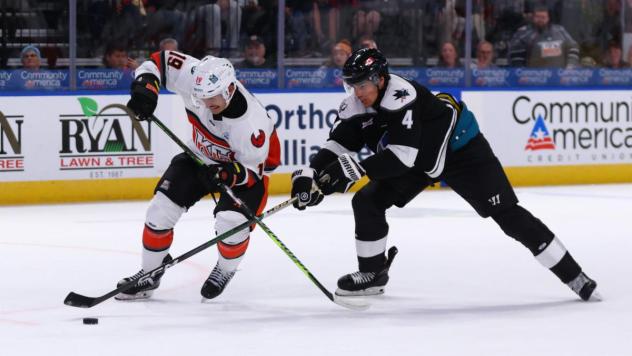 Kansas City Mavericks' Nolan Sullivan battles Wichita Thunder's Jeremie Bucheler