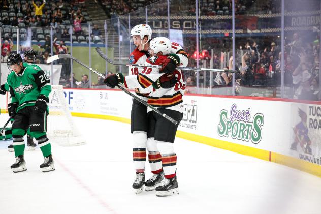 Tucson Roadrunners' Cameron Hebig and Maveric Lameroux celebrate goal