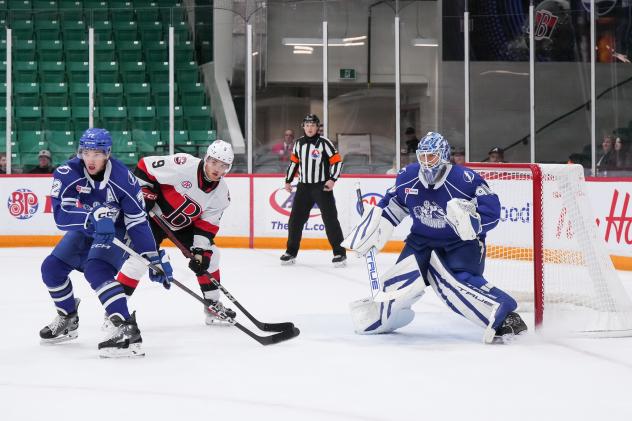 Syracuse Crunch defenseman Tyson Feist and goaltender Matt Tomkins vs. the Belleville Senators