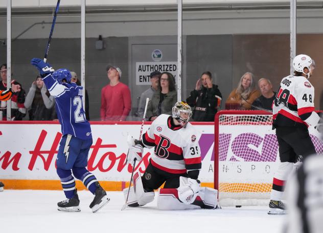 Syracuse Crunch forward Dylan Duke reacts after his goal against the Belleville Senators