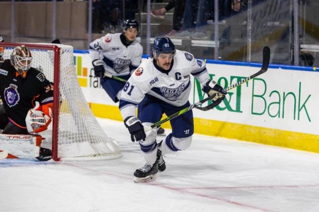 Worcester Railers forward Anthony Repaci races after the puck