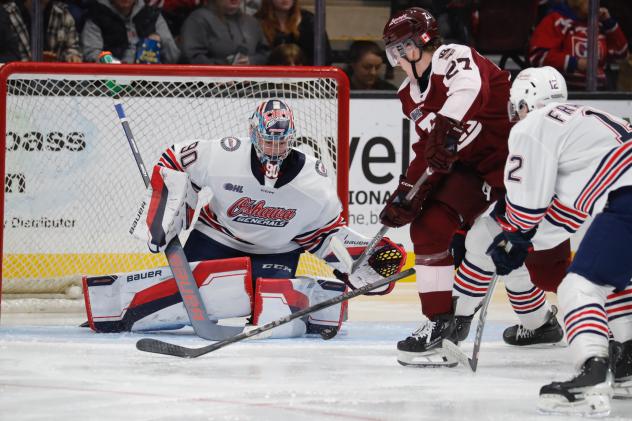 Peterborough Petes centre Colin Fitzgerald looks for an opening vs. the Oshawa Generals