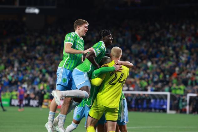Sounders FC react after their penalty kick win