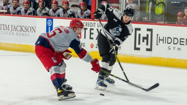 Wichita Thunder forward Michal Stinil (right) vs. the Allen Americans