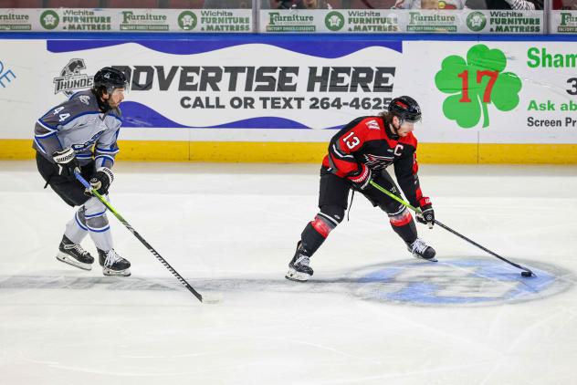 Rapid City Rush forward Ryan Wagner with the puck