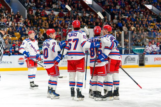 Kitchener Rangers gaterh following a goal