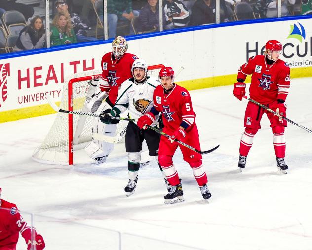 Allen Americans defenseman Hudson Wilson (center)