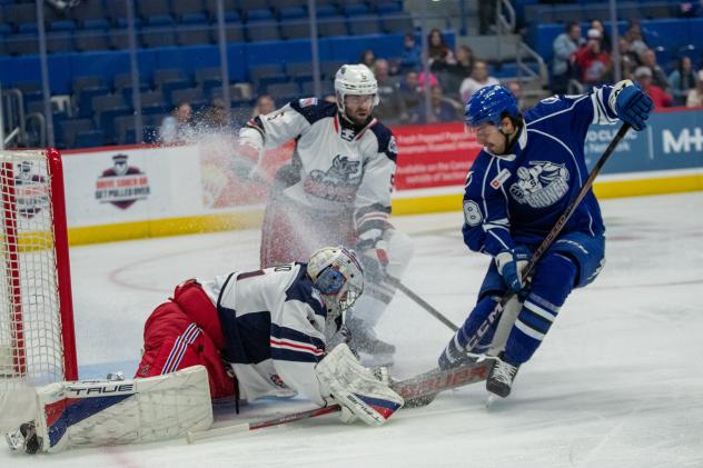 Syracuse Crunch forward Niko Huuhtanen looks for an opening against the Hartford Wolf Pack