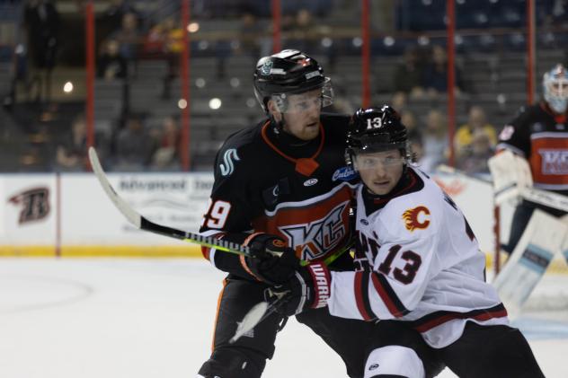 Rapid City Rush forward Ryan Wagner (right) vs. the Kansas City Mavericks