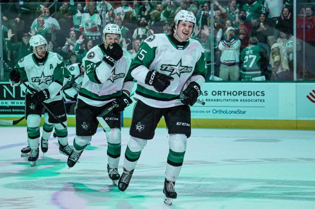 Texas Stars react after a goal