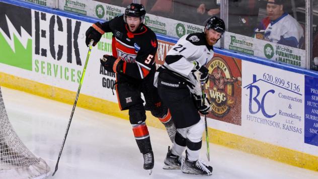 Wichita Thunder forward Jay Dickman (right) vs. the Kansas City Mavericks