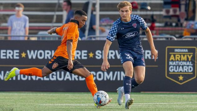 Indy Eleven midfielder Max Schneider (right)