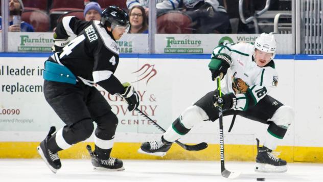 Wichita Thunder defenseman Jeremie Bucheler (left) vs. the Utah Grizzlies