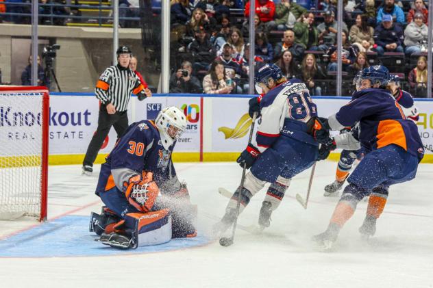 Flint Firebirds' Noah Bender versus Saginaw Spirit's Kristian Epperson