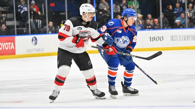 Utica Comets' Samuel Laberge and Syracuse Crunch's Maxim Groshev on game night
