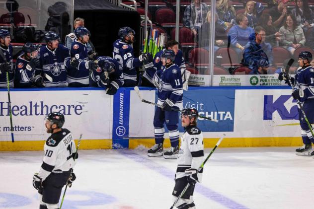 Worcester Railers forward Jack Randl receives congratulations along the bench