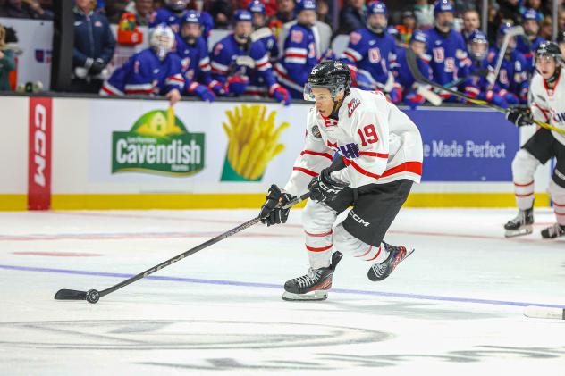 Forward Cameron Schmidt with Team CHL