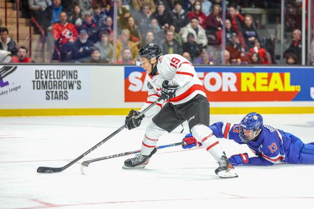 Forward Cameron Schmidt with Team CHL