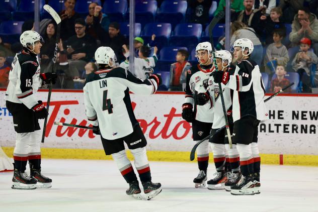 Vancouver Giants defenceman Ryan Lin offers congratulations