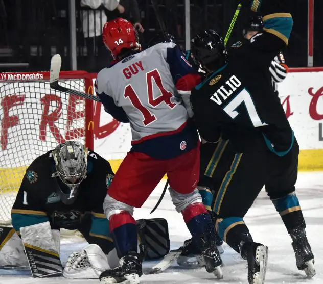 Allen Americans center Brayden Guy fights for position