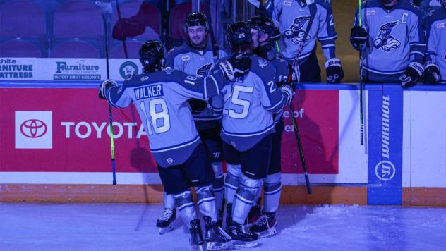 Wichita Thunder gather following a goal