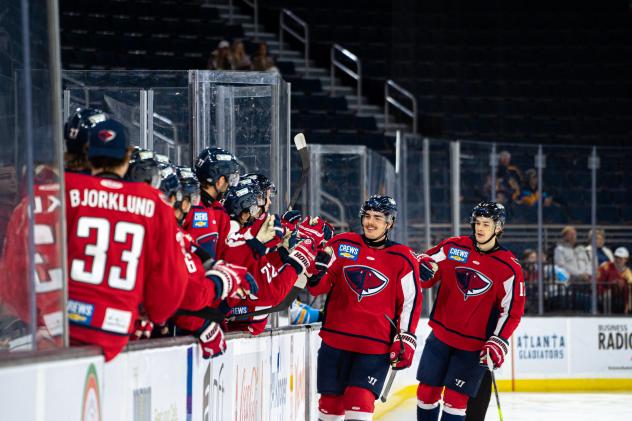 South Carolina Stingrays exchange congratulations along the bench